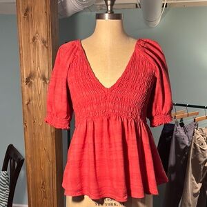 Coral Smocked Peplum Blouse with Puff Sleeves